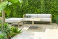 Beautiful outdoor patio with comfortable couch and table. Royalty Free Stock Photo