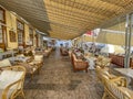 A beautiful outdoor restaurant cafe with a gorgeous view towards the Argosaronic gulf at the picuresque Greek Island of Hydra