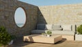 Beautiful outdoor terrace design with comfortable couch, circle window with beach view, stone wall Royalty Free Stock Photo