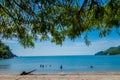 Beautiful outdoor view of Taganga, the caribbean coast with some tourists enjoying the sunny day in Colombia