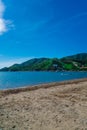 Beautiful outdoor view of Taganga, the caribbean coast with some tourists enjoying the sunny day in Colombia