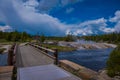 Beautiful outdoor view of wooden bridge over firehole river in the Yellowstone national park Royalty Free Stock Photo