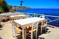 Beautiful outdor cafe on sea coast, Crete island, Greece. Royalty Free Stock Photo