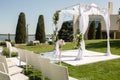 Beautiful outgoing wedding set up. Jewish Hupa on romantic wedding ceremony , wedding outdoor on the lawn. Wedding decor. A pink