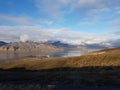 Beautiful overview photo of parts of longyear city airport with mighty mountains and sea Royalty Free Stock Photo