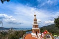 Beautiful pagoda of Thepnimit temple on high peak of Patong