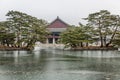 Beautiful Pagoda on the water in the greenery of trees in a Seoul park. Magnificent autumn landscape