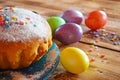 Beautiful painted eggs and cake. Royalty Free Stock Photo