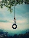 Beautiful painting of a boy swaying on a tire swing with a wonderful scenic view from above the town. Adventure and freedom Royalty Free Stock Photo