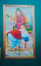 Beautiful Painting of a mother and his son. Mother doing handicraft.