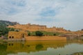 Beautiful palace reflecting in Maota Lake in Amber Fort in Jaipur, Rajasthan, India, fish eye effect Royalty Free Stock Photo