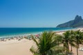 Beautiful palm trees on Ipanema beach in Rio de Janeiro with Dois Irmaos in the background