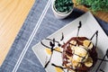 Pancake with chocolate ice cream on plate, top view Royalty Free Stock Photo