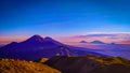 Beautiful panorama blue mountain with green forest and purple sky and blue cloud and fantastic nature Royalty Free Stock Photo