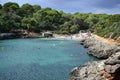 Rock formations for climbing at Cala Sa Nau beach and Cala d`Or city, Palma Mallorca Island, Spain Royalty Free Stock Photo