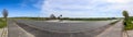 Beautiful panorama on a countryside corssing with fields and trees in northern europe Royalty Free Stock Photo