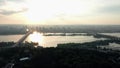 Beautiful panorama of Kiev at sunset. Paton bridge over Dnipro river.