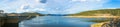Beautiful panorama landscape of lake and dam surrounded by hills