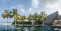 Beautiful panorama landscape view of infinity swimming pool at the tropical island luxury resort Royalty Free Stock Photo