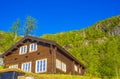 Beautiful panorama Norway Hemsedal Skicenter with Mountains and brown cabin