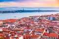 Beautiful panorama of old town Baixa district and Tagus River in Lisbon city during sunset, seen from Sao Jorge Castle Royalty Free Stock Photo