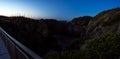 Beautiful panorama of an orange sunset at Pancake Rocks on a sunny winter day in Punakaiki, New Zealand