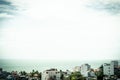 Beautiful panorama seaside town view real natural landscape photo background. Rooftops. Sea merges horizon skyline. Calm