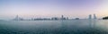 Beautiful panorama shot of Abu Dhabi city skyline towers and beach at sunset Royalty Free Stock Photo