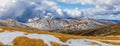 Beautiful panorama of snow covered Australian Alps and yellow gr Royalty Free Stock Photo