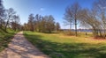 Beautiful panorama of spring landscapes with green grass and a clear blue sky Royalty Free Stock Photo