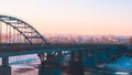 Panorama of transport on the bridge and sunrise over the Belaya River in Ufa, Bashkiria, Russia Royalty Free Stock Photo