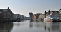 Beautiful panorama view of cityscape with two ships mooring in the Old Town in Gdansk Royalty Free Stock Photo