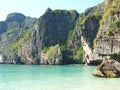 A beautiful panorama view with rocks, crystal clear water and white sandy beach. Royalty Free Stock Photo