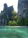 A beautiful panorama view with rocks, crystal clear water and white sandy beach in Thailand. Royalty Free Stock Photo