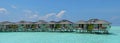 Beautiful panorama of the water bungalows at the tropical island at Maldives Royalty Free Stock Photo