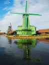Beautiful panorama of Zaanse Scans in the Netherlands. Windmills on ponds and streams