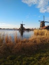 Beautiful panorama of Zaanse Scans in the Netherlands. Windmills on ponds and streams