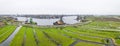 beautiful panorama of Zaanse Schans windmills park and fields landscape in Zaandam near Amsterdam, North Holland Royalty Free Stock Photo