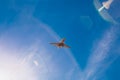 Beautiful Panoramic Background with flying plane in blue sky. Passenger airplane takes off in sky. Travel concept. Wide