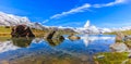 Beautiful panoramic summer view of the Stellisee lake with reflection of the iconic Matterhorn Royalty Free Stock Photo