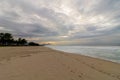 Beautiful panoramic sunrise on the beach of Barra da Tijuca with the stone of GÃÂ¡vea in the background Royalty Free Stock Photo