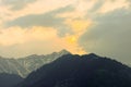 Beautiful panoramic sunrise sunset over the mountains above the valley Dramatic landscape Himalayas