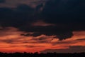Beautiful panoramic sunset dramatic red sky with dark blue rainy Royalty Free Stock Photo
