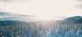 Beautiful panoramic sunset over a wild snow covered mountains Royalty Free Stock Photo