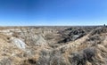 A beautiful panoramic view of the badlands in Dinosaur provincial park, Alberta, Canada.  Full of valleys of hoodoos and coulees. Royalty Free Stock Photo