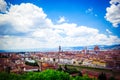 Beautiful panoramic view Florence Firenze, Italian renaissance churches. Summer scenery. Sunny day, blue sky with cumulus clouds.