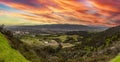 Beautiful panoramic view from the Hollywood Mountain of Griffith Park under a beautiful red sky, in the city of Los Angeles in the Royalty Free Stock Photo