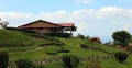 Beautiful panoramic view of houses in the mountains in Costa Rica with green jungle