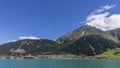 Beautiful panoramic view of Lake Resia and the homonymous village in the province of Bolzano, South Tyrol, Italy