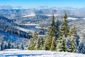 Beautiful panoramic view over the `Marisel` ski slope in winter season and Belis lake in the valley, Cluj county Romania